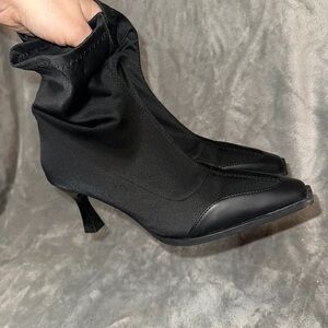 Sleek Black Stretch Sock Ankle Boots with Sculpted Heel